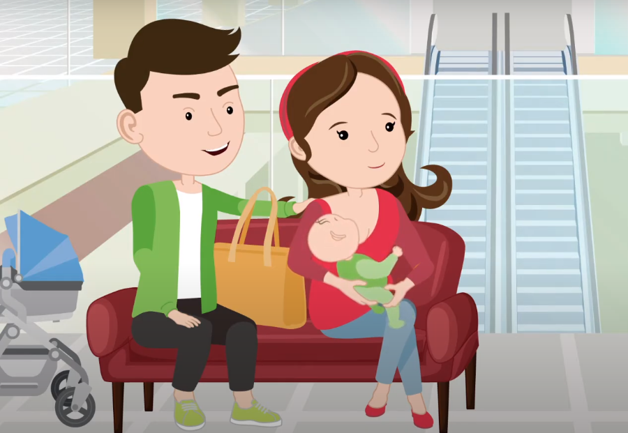 Picture of a woman breastfeeding inside a shopping mall Picture of a woman breastfeeding inside a shopping mall